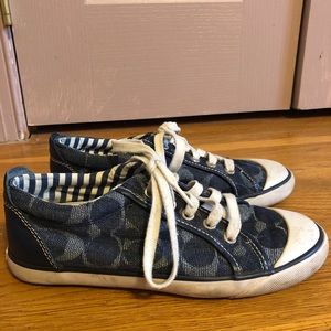 Navy blue patterned Coach sneakers with logo